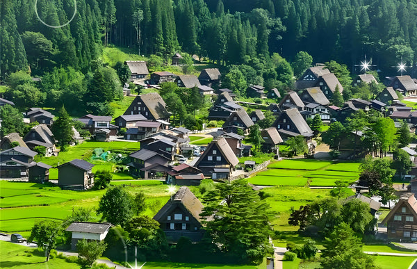 Panoramic view of Shirakawa-go village and gassho-zukuri thatched-roof houses in green mountains