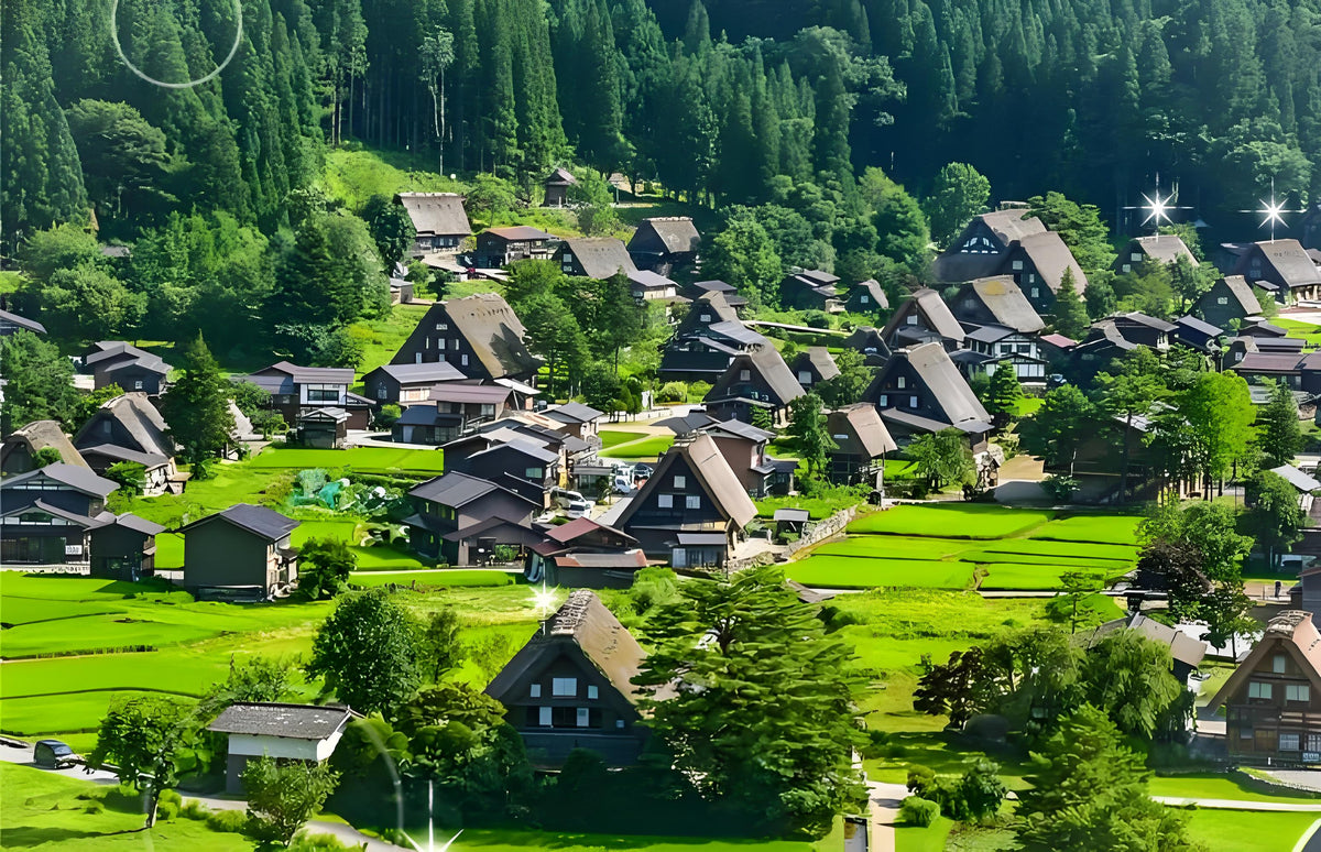 Panoramic view of Shirakawa-go village and gassho-zukuri thatched-roof houses in green mountains